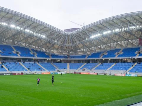 At the stadium before the match. Half empty stadium. The fans haven't arriv.. Stock Photos