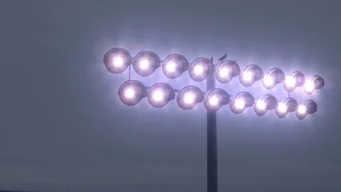 StadiumLightsTurningOn Stock Footage 82608403
