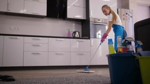 Staff of cleaning service during work in kitchen Stock Footage 119339280