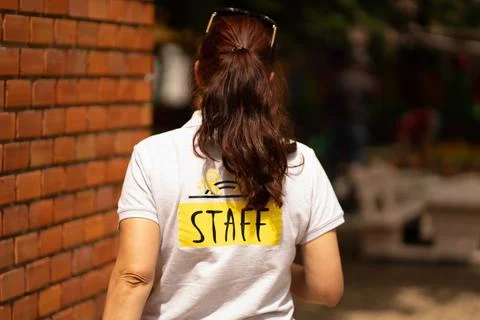 Staff member going to do some work outside Stock Photos
