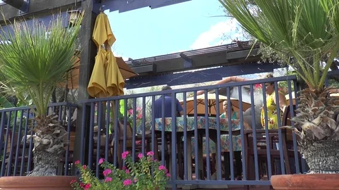 Staff Move Table on Patio 스톡 동영상 82846712