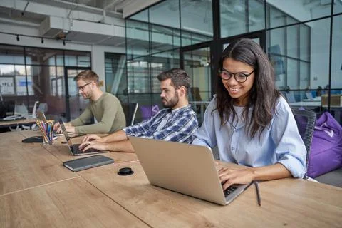 Staff operating on computer in cozy and modern office Foto stock