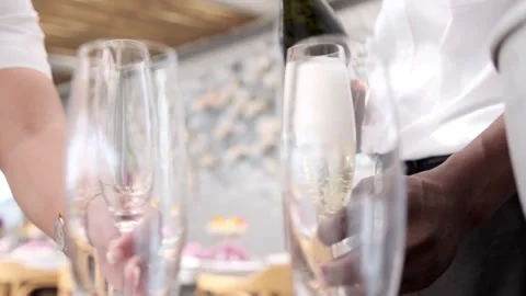 Staff pouring champagne at a function Stock Footage 236598649