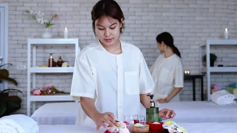 Staff prepare aromatherapy equipment spa Stock Footage 245076799