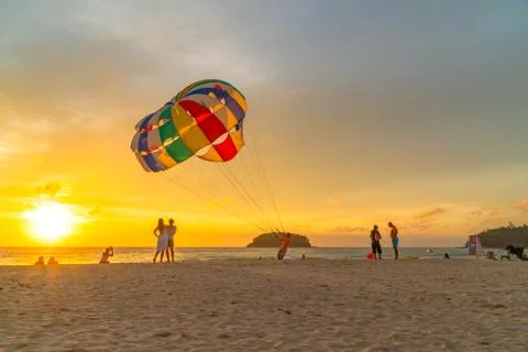 A staff pulling parasail on the beach Foto stock