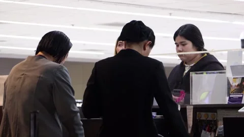 Staff services guests at the counter in the food counter Stock Footage 299653053