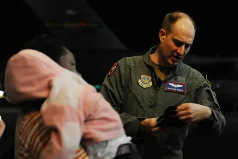 Staff Sgt. Eric Morris a loadmaster with the 4th Air Lift Squadron McChord... Photos