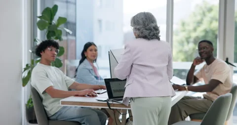 Staff, talking or manager with document in digital agency,  project briefing or Stock Footage 329397488