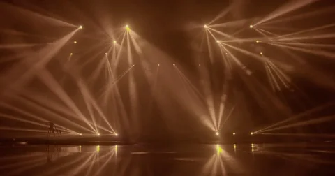 Stage beam lights in tv set studio colours Stock Footage 80181560