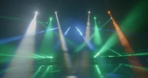 Stage beam lights in tv set studio colours Stock Footage 80181621