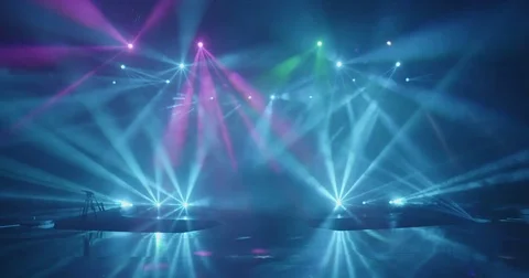 Stage beam lights in tv set studio colours Stock Footage 80181888
