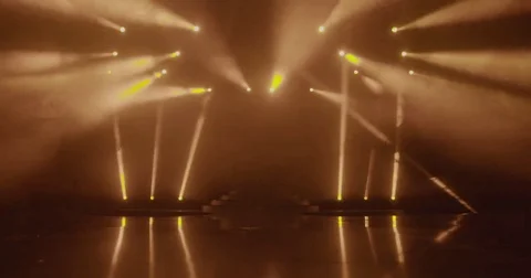 Stage beam lights in tv set studio colours Stock Footage 80181938
