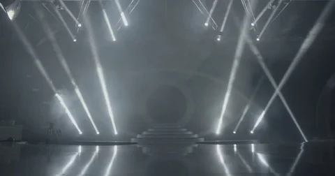 Stage beam lights in tv set studio colours Stock Footage 80191963