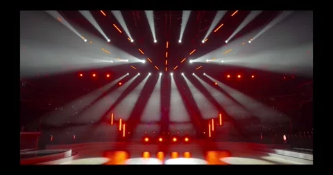 Stage beam lights in tv set studio colours Stock Footage 274386985