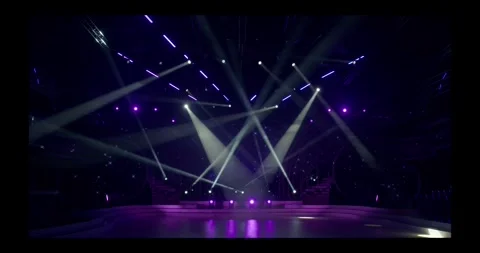 Stage beam lights in tv set studio colours Stock Footage 274386993
