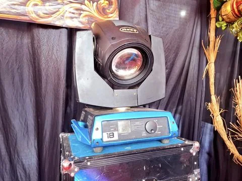 Stage beam moving head lighting equipment on blue base Stock Photos