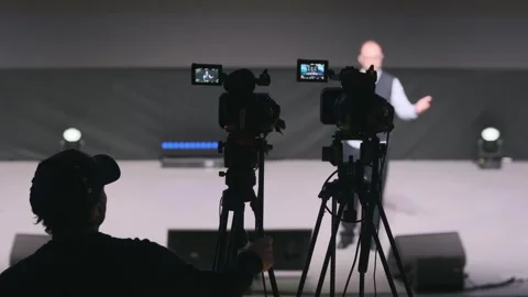 Stage camera setup captures professional presentation during liv Stock Footage 322089631