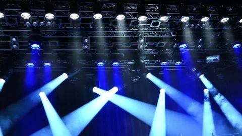 Stage ceiling spotlights lighting the stage during the show Video stock 258564524