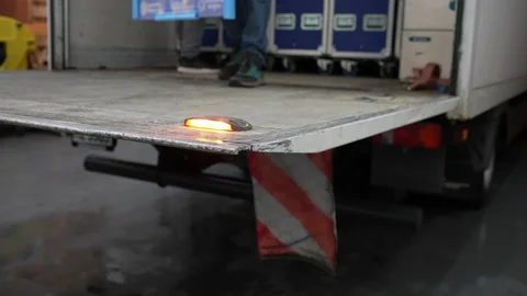 Stage Crew moving Flightcase out of the Truck, event, concert venue Stock Footage 237462113