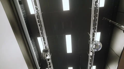 Stage equipment includes projectors and hanging lamps Видео 335193595