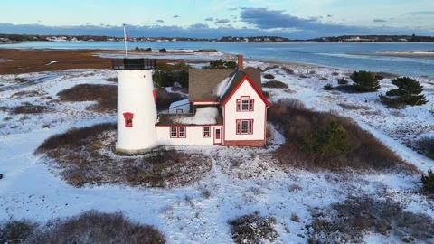 Stage Harbor Lighthouse Aerial in Winter with Snow at Chatham, Cape Cod Stock Footage 325629852