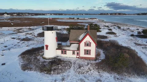 Stage Harbor Lighthouse Aerial in Winter with Snow at Chatham, Cape Cod Stock Footage 325629858