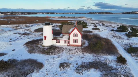 Stage Harbor Lighthouse Aerial in Winter with Snow at Chatham, Cape Cod Stock Footage 325629859