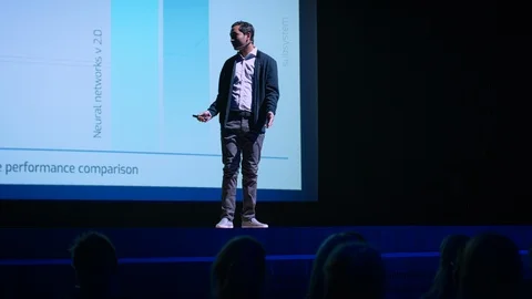 On Stage: Inspirational Star Speaker, Talking about Technology, Science, Success Stock Footage 122814240
