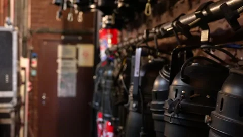Stage lighting and audio equipment in backstage storage Stock Footage 304801083