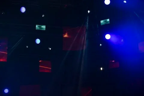 Stage lighting on a dark blue background. Stock Photos