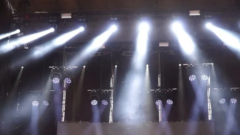 Stage lights are turned on during the concert blinking and shining. Stock Footage 99496771