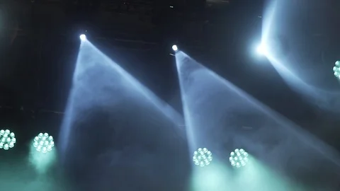 Stage lights are turned on during the concert blinking and shining. Stock Footage 99496834