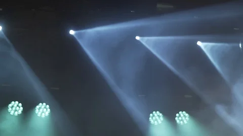 Stage lights are turned on during the concert blinking and shining. Stock Footage 99496846