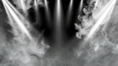 Stage lights beam through smoke and fog with dust particles on black background Stock Footage 340612337