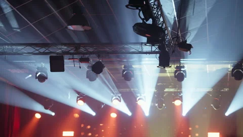 Stage Lights Beaming Through Haze at Live Event Video stock 335271448