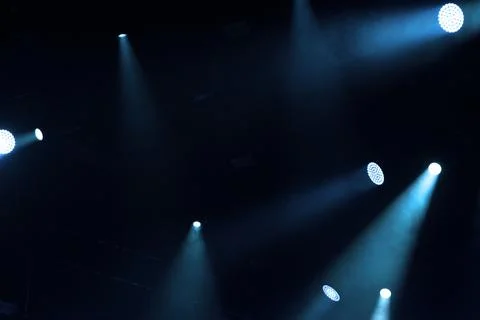 Stage lights glowing in the dark Stock Photos