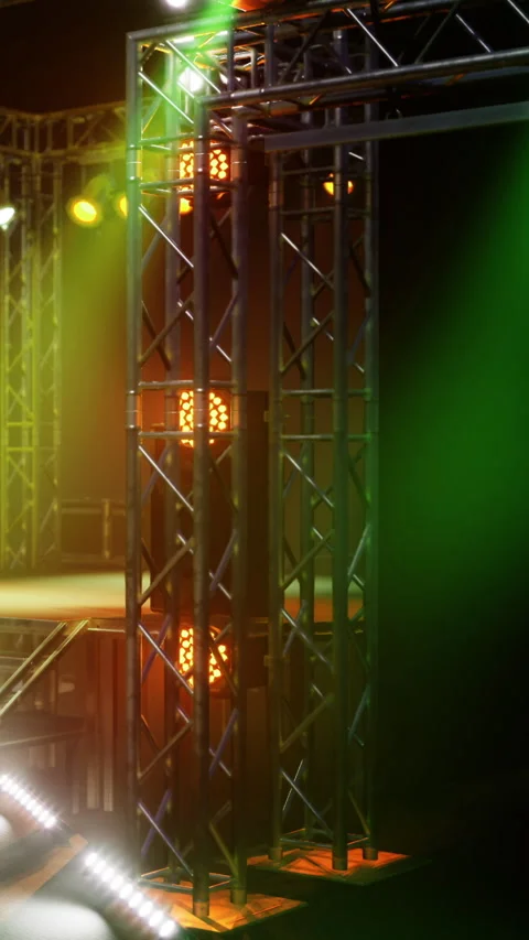 Stage with lights set up for performance in a dark venue Video stock 330163324