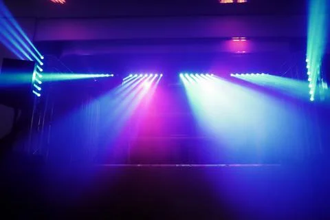 A stage with lights shining on it Stock Photos