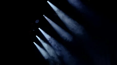 Stage lights in the studio. Stage lighting with a little smoke. Rays of light Stock Footage 255801866