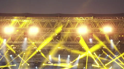 Stage lights,robotic spots,par,floodlights during live concert slomo 100p Stock Footage 64295059