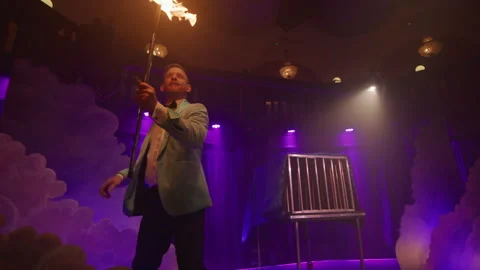 Stage Man holding a Fire on the stick Stock Footage 270480656