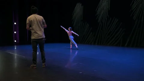 Stage manager and choreographer preparing on stage Stock Footage 220947123