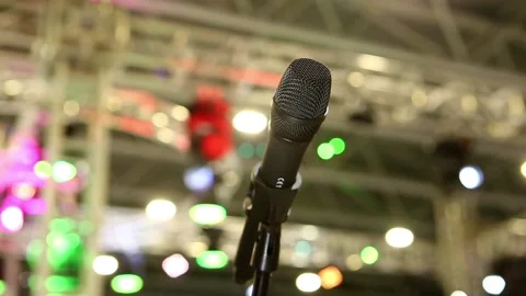 Stage microphone with blurred background Video stock 165416605