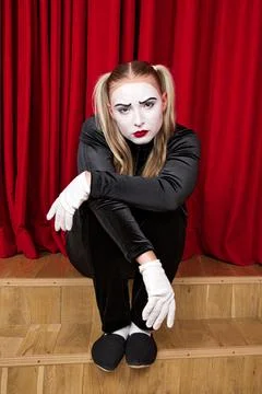 On stage is a pantomime artist with a dramatic expression on his face Stock Photos