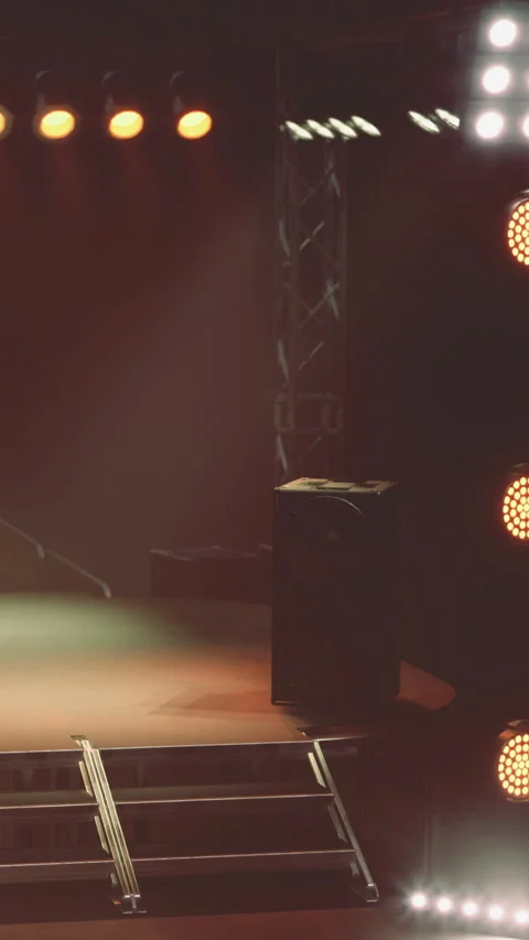 Stage setup with lights and speaker ready for performance in evening Stock Footage 332212426