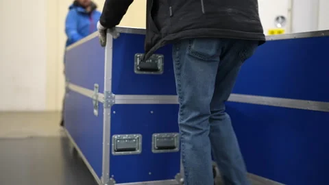 Stage Sound Crew pushing a Flightcase. The Stage Worker Roadie at concert. 스톡 동영상 237462423