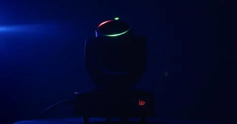 Stage spotlight in dark blue studio with RGB ring light Stock Photos