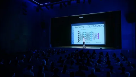 Stage: Tech Start-up CEO Shows Cinema Screen With Neural Network Machine Stock Footage 126502680