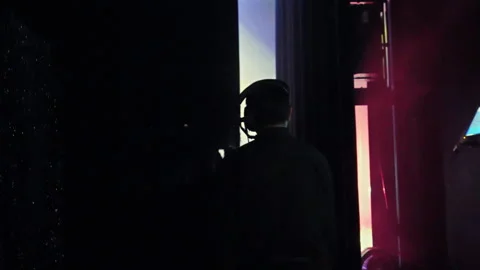 Stage worker working behind the scenes Stock Footage 303790530