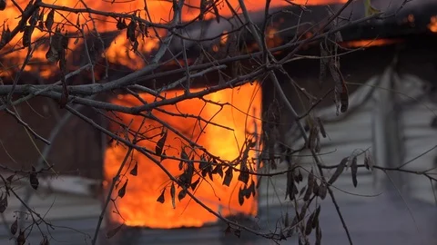Staged fire demonstration , abandoned house fire Stock Footage 100047871